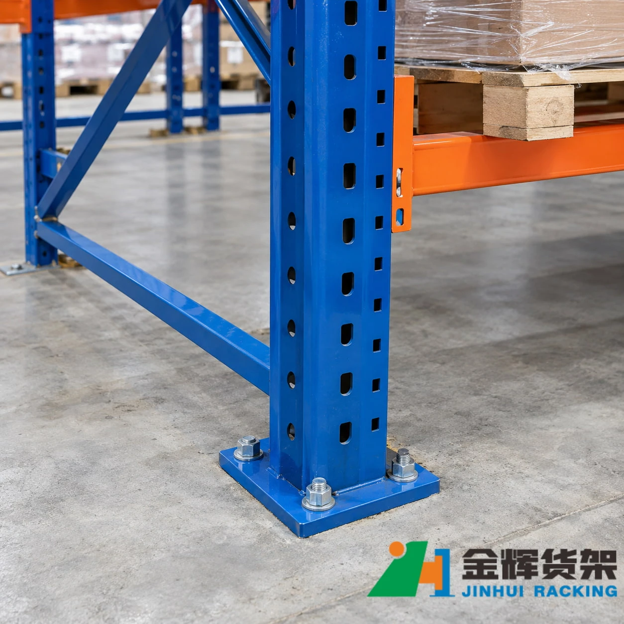 Pallet rack floor anchor securing an upright base plate to a concrete warehouse floor Pallet rack floor anchor securing an upright base plate to a concrete warehouse floor