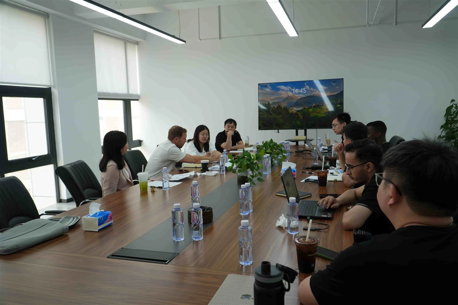 Warehouse purchasing team comparing pallet rack supplier quotations rack specifications and component lists Warehouse purchasing team comparing pallet rack supplier quotations rack specifications and component lists